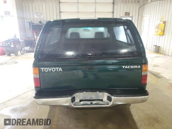 1999 Toyota Tacoma with VIN 4TANL42N4XZ453505, listed as a Copart auction lot 63399325 with 175,198 mi miles and Salvage title. Bid and sale history available at DreamBid. Image 6.