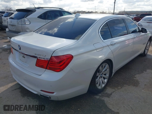 2011 BMW 7 Series 750Li with VIN WBAKB8C57BCY66558, listed as a IAAI auction lot 41494697 with 102,560 mi miles. Bid and sale history available at carsss.com. Image 4.