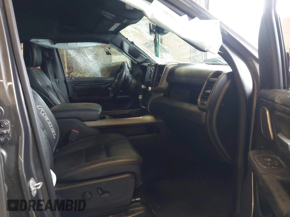 2020 Ram 1500 Rebel with VIN 1C6SRFLT0LN162491, listed as a IAAI auction lot 41841159 with 58,265 mi miles and . Bid and sale history available at DreamBid. Image 5.