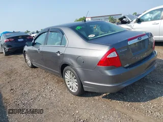 2011 Ford Fusion Hybrid with VIN 3FADP0L34BR253253, listed as a IAAI auction lot 42458290 with 137,110 mi miles and . Bid and sale history available at DreamBid. Image 3.