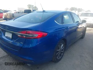 2017 Ford Fusion SE with VIN 3FA6P0H78HR357919, listed as a IAAI auction lot 42027162 with 216,127 mi miles. Bid and sale history available at carsss.com. Image 4.
