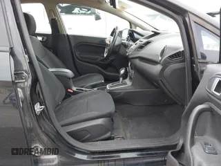 2015 Ford Fiesta SE z VIN 3FADP4EJ3FM115466, wystawiony jako IAAI lot #41849165 z przebiegiem 178 002 mil mil oraz . Historia ofert i sprzedaży dostępna na DreamBid. Obrazek 5.