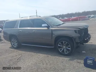 2016 Chevrolet Suburban LTZ with VIN 1GNSKJKC9GR255307, listed as a IAAI auction lot 41785233 with 202,101 mi miles. Bid and sale history available at carsss.com. Image 13.