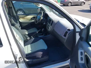 2006 Ford Escape XLT with VIN 1FMCU03116KA05836, listed as a IAAI auction lot 42310284 with 128,620 mi miles and . Bid and sale history available at DreamBid. Image 5.