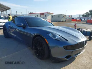 2012 Fisker Karma EcoSport z VIN YH4K14AA5CA000763, wystawiony jako IAAI lot #41970026 z przebiegiem Nie podano mil oraz . Historia ofert i sprzedaży dostępna na DreamBid. Obrazek 1.