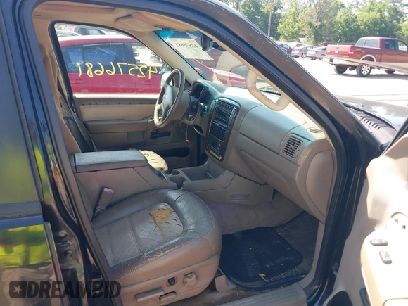 2002 Ford Explorer Eddie Bauer z VIN 1FMDU74W72UA71653, wystawiony jako IAAI lot #42576681 z przebiegiem 175 401 mil mil oraz . Historia ofert i sprzedaży dostępna na DreamBid. Obrazek 5.