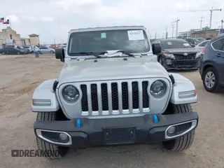 2023 Jeep Wrangler Sahara with VIN 1C4JJXP62PW627455, listed as a IAAI auction lot 42115137 with 62,143 mi miles and . Bid and sale history available at carsss.com. Image 12.