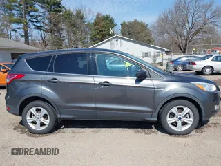 2015 Ford Escape SE with VIN 1FMCU9GX1FUC19376, listed as a IAAI auction lot 41769390 with 98,334 mi miles. Bid and sale history available at carsss.com. Image 13.