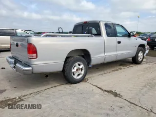 1998 Dodge Dakota SLT z VIN 1B7GL22X8WS651451, wystawiony jako Copart lot #54556125 z przebiegiem 164 186 mil mil oraz Szkoda całkowita • Salvage title. Historia ofert i sprzedaży dostępna na DreamBid. Obrazek 3.