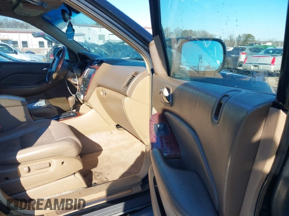 2004 Acura MDX Touring Pkg w/Navigation with VIN 2HNYD18824H501507, listed as a IAAI auction lot 41352086 with 319,002 mi miles. Bid and sale history available at carsss.com. Image 5.