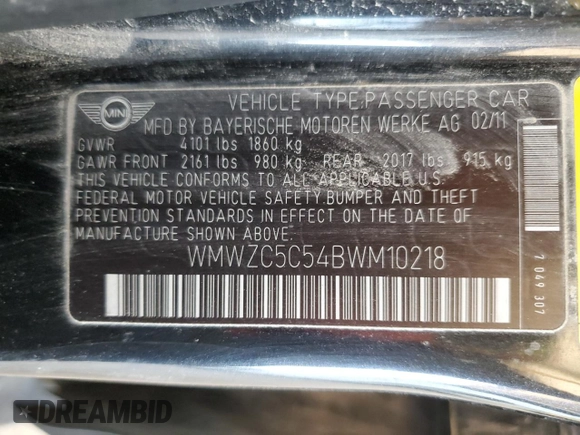 2011 MINI Countryman S with VIN WMWZC5C54BWM10218, listed as a Copart auction lot 60557685 with 192,422 mi miles and Salvage title. Bid and sale history available at DreamBid. Image 12.