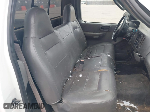 2003 Ford F-150 XL with VIN 1FTRF17273NA15637, listed as a IAAI auction lot 41952924 with 215,704 mi miles and . Bid and sale history available at DreamBid. Image 8.