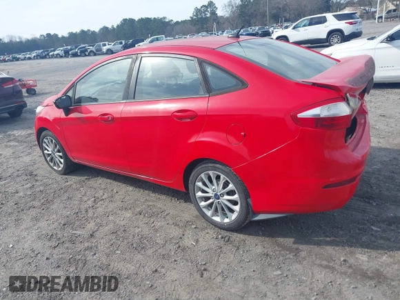 2014 Ford Fiesta SE with VIN 3FADP4BJ8EM170837, listed as a IAAI auction lot 41656071 with 128,334 mi miles and . Bid and sale history available at DreamBid. Image 3.