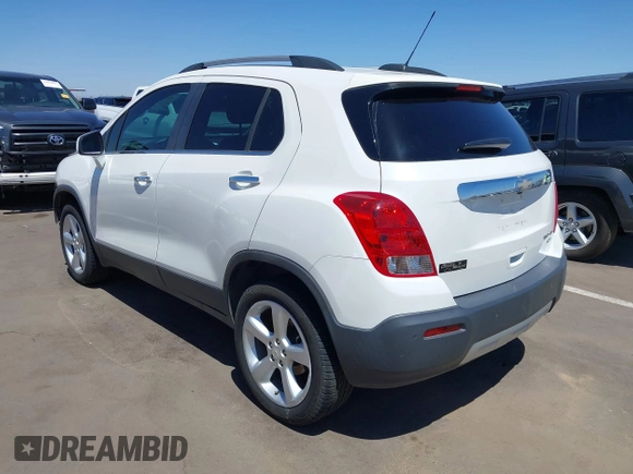 2015 Chevrolet Trax LTZ with VIN KL7CJTSBXFB236823, listed as a IAAI auction lot 42045817 with 138,930 mi miles. Bid and sale history available at carsss.com. Image 3.