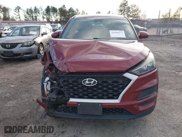 2019 Hyundai Tucson SE with VIN KM8J2CA49KU881841, listed as a IAAI auction lot 41099575 with 129,153 mi miles. Bid and sale history available at carsss.com. Image 12.