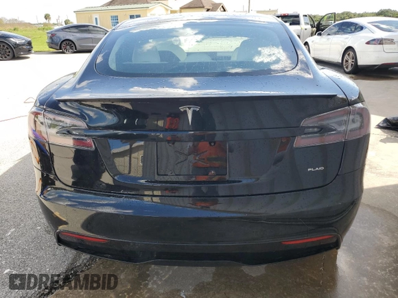 2022 Tesla Model S Plaid z VIN 5YJSA1E64NF461218, wystawiony jako Copart lot #74178794 z przebiegiem Nie podano mil oraz Szkoda całkowita • Salvage title. Historia ofert i sprzedaży dostępna na DreamBid. Obrazek 6.