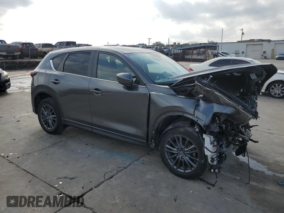 2021 Mazda CX-5 Touring with VIN JM3KFACM9M0330485, listed as a Copart auction lot 44622895 with Not Provided miles and Salvage Title. Bid and sale history available at DreamBid. Image 4.
