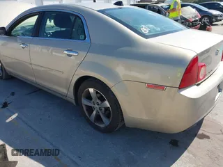 2012 Chevrolet Malibu 1LT with VIN 1G1ZC5E05CF103123, listed as a IAAI auction lot 42064529 with 137,801 mi miles and . Bid and sale history available at DreamBid. Image 3.