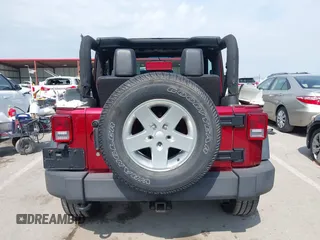 2013 Jeep Wrangler Sport z VIN 1C4GJWAG0DL543850, wystawiony jako IAAI lot #42374916 z przebiegiem 163 977 mil mil oraz . Historia ofert i sprzedaży dostępna na DreamBid. Obrazek 16.