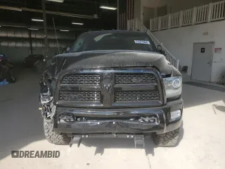 2014 Ram 3500 Laramie with VIN 3C63R3JL9EG258069, listed as a Copart auction lot 71571664 with 104,983 mi miles and Salvage Title. Bid and sale history available at carsss.com. Image 5.