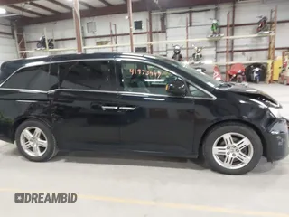 2011 Honda Odyssey Touring с VIN 5FNRL5H9XBB055008, выставлен на аукционе IAAI как лот 41973447 с пробегом 218 762 миль миль и . История ставок и продаж доступна на DreamBid. Изображение 13.