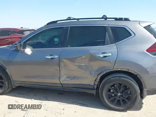 2018 Nissan Rogue SV with VIN 5N1AT2MT2JC749146, listed as a IAAI auction lot 41672824 with 121,377 mi miles and . Bid and sale history available at carsss.com. Image 14.
