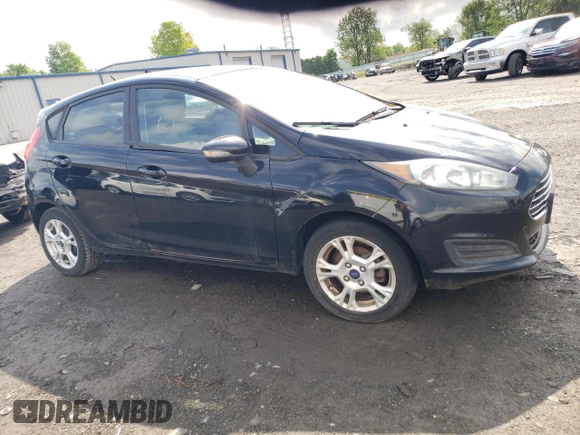 2016 Ford Fiesta SE z VIN 3FADP4EJ3GM155158, wystawiony jako Copart lot #55883465 z przebiegiem 116 184 mil mil oraz Czysty tytuł • Clean title. Historia ofert i sprzedaży dostępna na DreamBid. Obrazek 4.