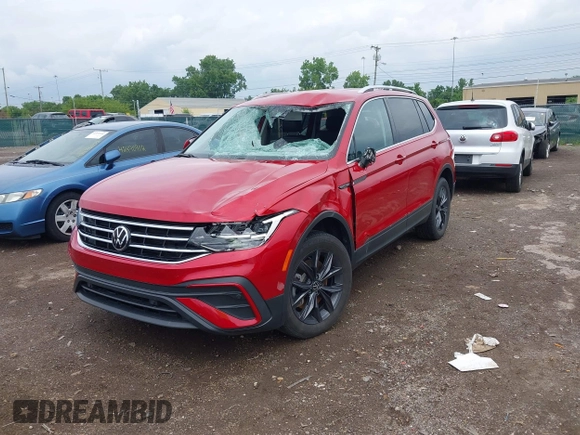 2022 Volkswagen Tiguan SE z VIN 3VV2B7AX0NM020942, wystawiony jako IAAI lot #42475302 z przebiegiem 26 353 mil mil oraz . Historia ofert i sprzedaży dostępna na DreamBid. Obrazek 12.
