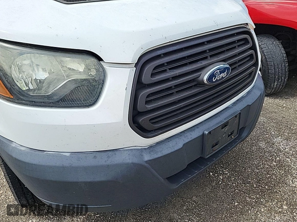 2016 Ford Transit Cargo with VIN 1FTYE1ZM1GKA06047, listed as a IAAI auction lot 42679265 with 124,601 mi miles and . Bid and sale history available at DreamBid. Image 18.