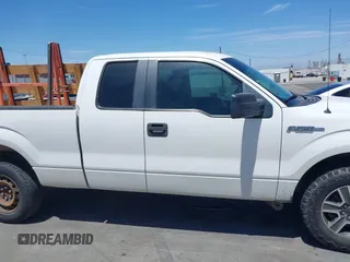 2014 Ford F-150 XL with VIN 1FTEX1CMXEFD13082, listed as a IAAI auction lot 40035539 with 204,751 mi miles and . Bid and sale history available at DreamBid. Image 14.