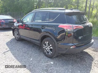 2017 Toyota RAV4 LE with VIN 2T3BFREV5HW651308, listed as a IAAI auction lot 42701783 with 112,829 mi miles and . Bid and sale history available at DreamBid. Image 3.