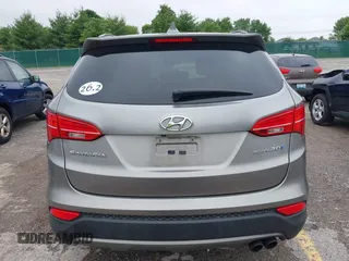 2014 Hyundai Santa Fe z VIN 5XYZW3LA2EG217854, wystawiony jako IAAI lot #42318822 z przebiegiem 120 234 mil mil oraz . Historia ofert i sprzedaży dostępna na DreamBid. Obrazek 16.