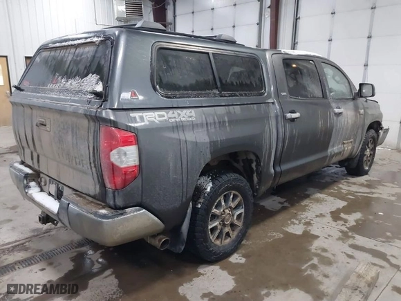 2014 Toyota Tundra 4WD Truck SR5 with VIN 5TFDW5F10EX342818, listed as a IAAI auction lot 41067866 with 226,988 mi miles. Bid and sale history available at carsss.com. Image 4.