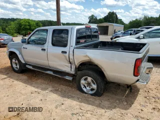 2000 Nissan Frontier XE with VIN 1N6ED27T8YC306716, listed as a Copart auction lot 55676965 with Not provided miles and Salvage title. Bid and sale history available at DreamBid. Image 2.