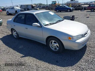 2000 Toyota Corolla VE with VIN 1NXBR18E5YZ384071, listed as a IAAI auction lot 42715411 with 183,983 mi miles and . Bid and sale history available at DreamBid. Image 1.