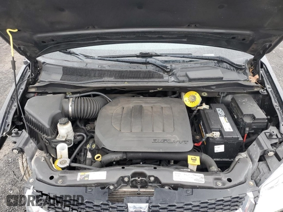 2019 Dodge Grand Caravan SXT with VIN 2C4RDGCG4KR580424, listed as a Copart auction lot 52715245 with 130,696 mi miles and Salvage Title. Bid and sale history available at DreamBid. Image 14.