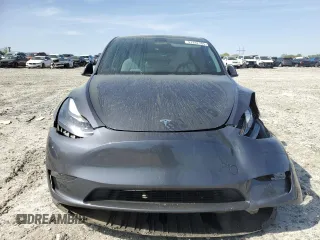 2023 Tesla Model Y Long Range z VIN 7SAYGAEE9PF662103, wystawiony jako Copart lot #51332105 z przebiegiem 35 294 mil mil oraz Szkody całkowita. Historia ofert i sprzedaży dostępna na DreamBid. Obrazek 5.