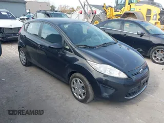 2011 Ford Fiesta SES with VIN 3FADP4FJ8BM201669, listed as a IAAI auction lot 40745834 with 166,802 mi miles. Bid and sale history available at carsss.com. Image 1.