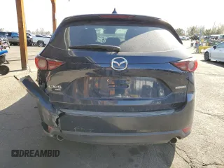 2020 Mazda CX-5 Grand Touring with VIN JM3KFBDM3L0786159, listed as a Copart auction lot 48535635 with 87,540 mi miles and Salvage Title. Bid and sale history available at carsss.com. Image 6.
