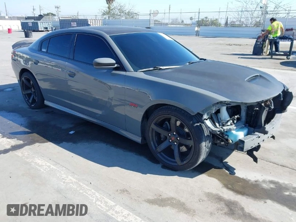 2019 Dodge Charger Scat Pack with VIN 2C3CDXGJ4KH576394, listed as a IAAI auction lot 41846702 with 70,209 mi miles and . Bid and sale history available at DreamBid. Image 1.