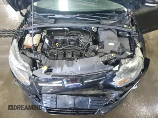 2014 Ford Focus Titanium with VIN 1FADP3N2XEL131392, listed as a Copart auction lot 61665025 with 105,597 mi miles and Salvage title. Bid and sale history available at DreamBid. Image 11.