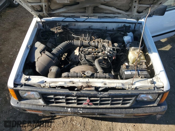 1990 Mitsubishi Mighty Max z VIN JA7FL24W3LP007688, wystawiony jako Copart lot #42651005 z przebiegiem 265 379 mil mil oraz Tytuł czysty. Historia ofert i sprzedaży dostępna na DreamBid. Obrazek 11.