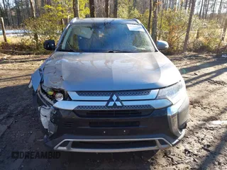 2020 Mitsubishi Outlander ES with VIN JA4AZ3A31LZ041204, listed as a IAAI auction lot 41265645 with 98,372 mi miles and . Bid and sale history available at DreamBid. Image 13.
