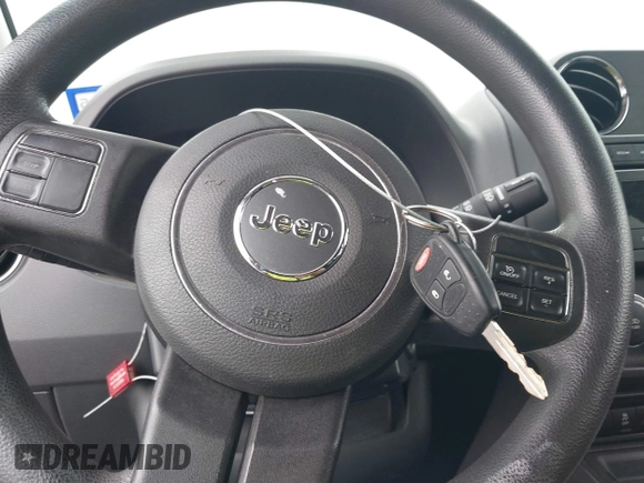 2014 Jeep Compass Sport with VIN 1C4NJCBB0ED647937, listed as a IAAI auction lot 41444062 with 135,679 mi miles and . Bid and sale history available at DreamBid. Image 11.