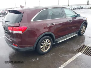 2018 Kia Sorento LX with VIN 5XYPG4A34JG347093, listed as a IAAI auction lot 41809115 with 106,494 mi miles. Bid and sale history available at carsss.com. Image 4.