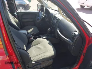 2004 Jeep Liberty Sport with VIN 1J4GL48K04W326252, listed as a IAAI auction lot 41479037 with 168,994 mi miles. Bid and sale history available at carsss.com. Image 5.