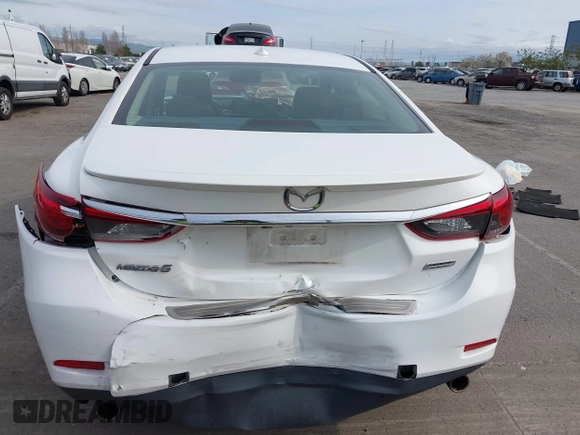 2016 Mazda Mazda6 i Grand Touring with VIN JM1GJ1W51G1444867, listed as a IAAI auction lot 41988597 with 86,844 mi miles. Bid and sale history available at carsss.com. Image 16.
