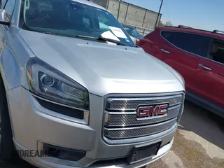 2014 GMC Acadia Denali z VIN 1GKKRTKD0EJ192610, wystawiony jako IAAI lot #41819095 z przebiegiem 121 075 mil mil oraz . Historia ofert i sprzedaży dostępna na DreamBid. Obrazek 6.