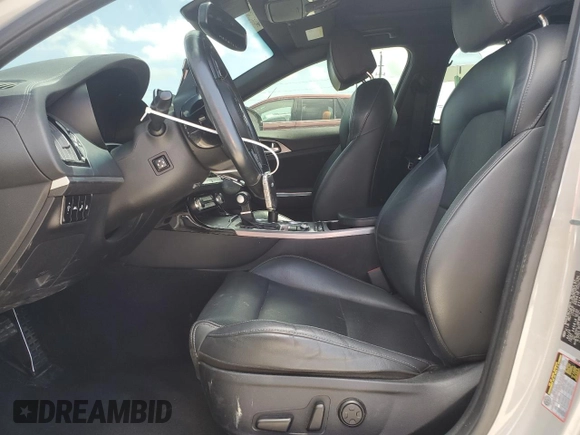 2020 Kia Stinger GT1 with VIN KNAE45LC2L6084091, listed as a Copart auction lot 51410175 with 129,049 mi miles and Salvage Title. Bid and sale history available at DreamBid. Image 7.