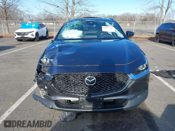 2022 Mazda CX-30 S Premium with VIN 3MVDMBDL9NM403273, listed as a IAAI auction lot 41607227 with Not Provided miles and . Bid and sale history available at carsss.com. Image 13.